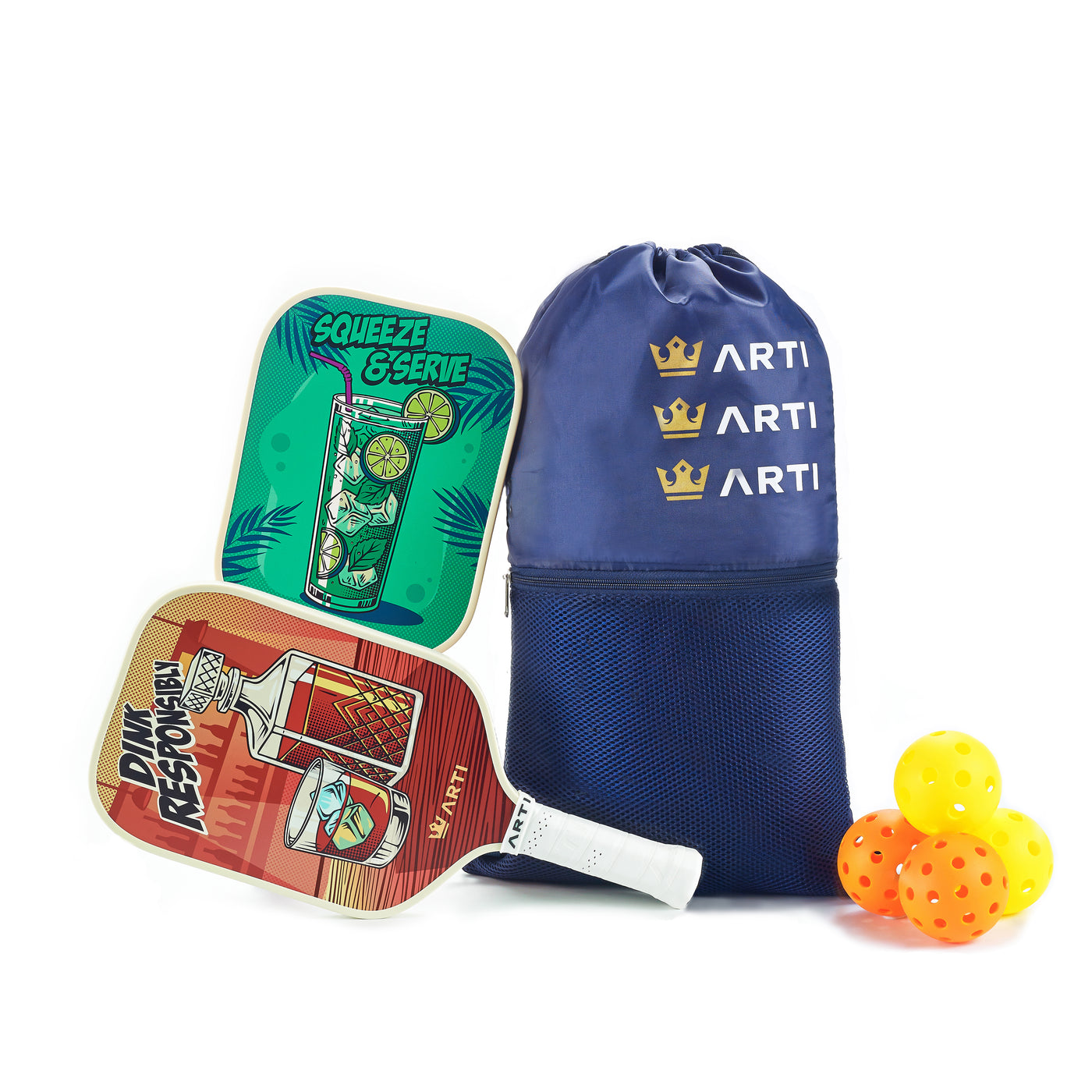 ARTI Drinks fiberglass pickleball paddle set leaning on carry bag with four outdoor pickleballs (image 4)